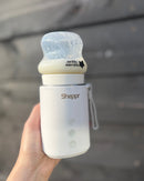 Flessenwarmer + Tommee Tippee adapter
